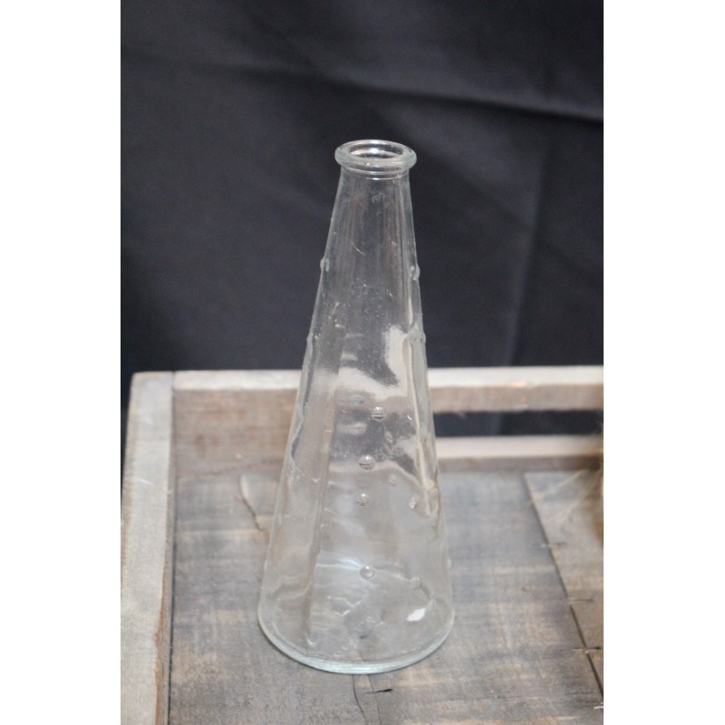 Petite bouteille avec des points incrustés